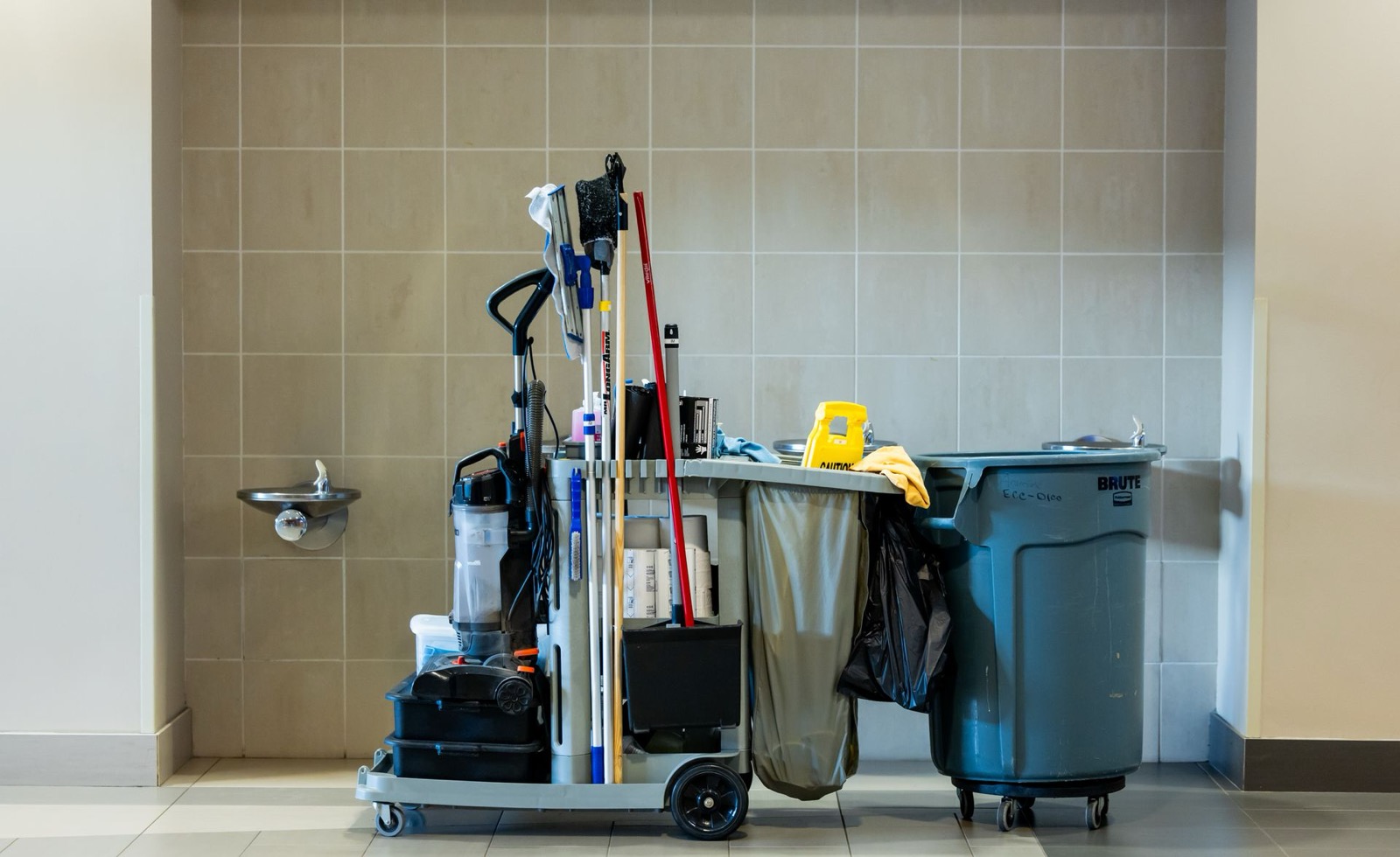 Fully stocked professional cleaning cart, ready to go on the job