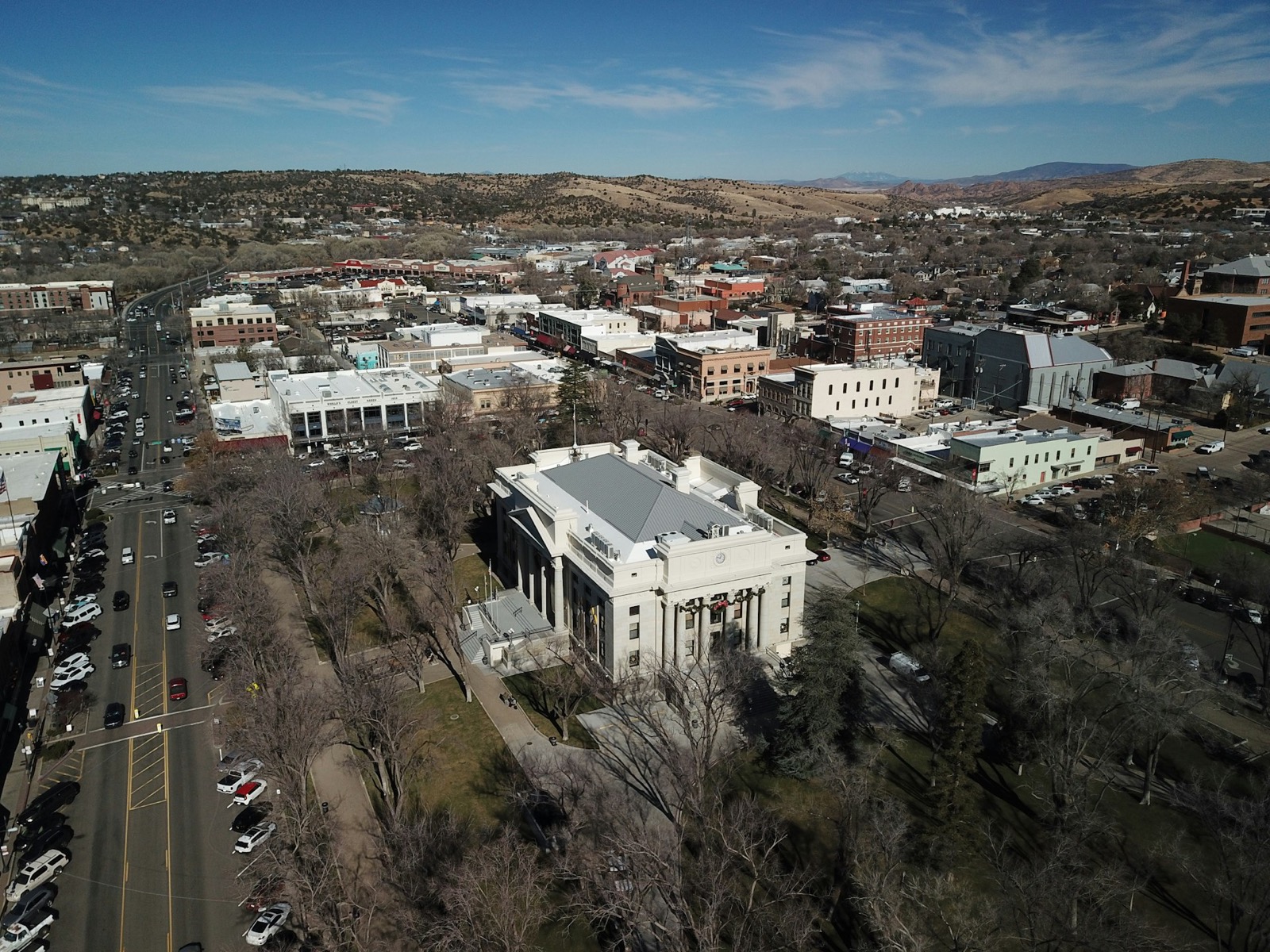 Aerial drone view overlooking the historic Yavapai County Courthouse and downtown Prescott, Arizona